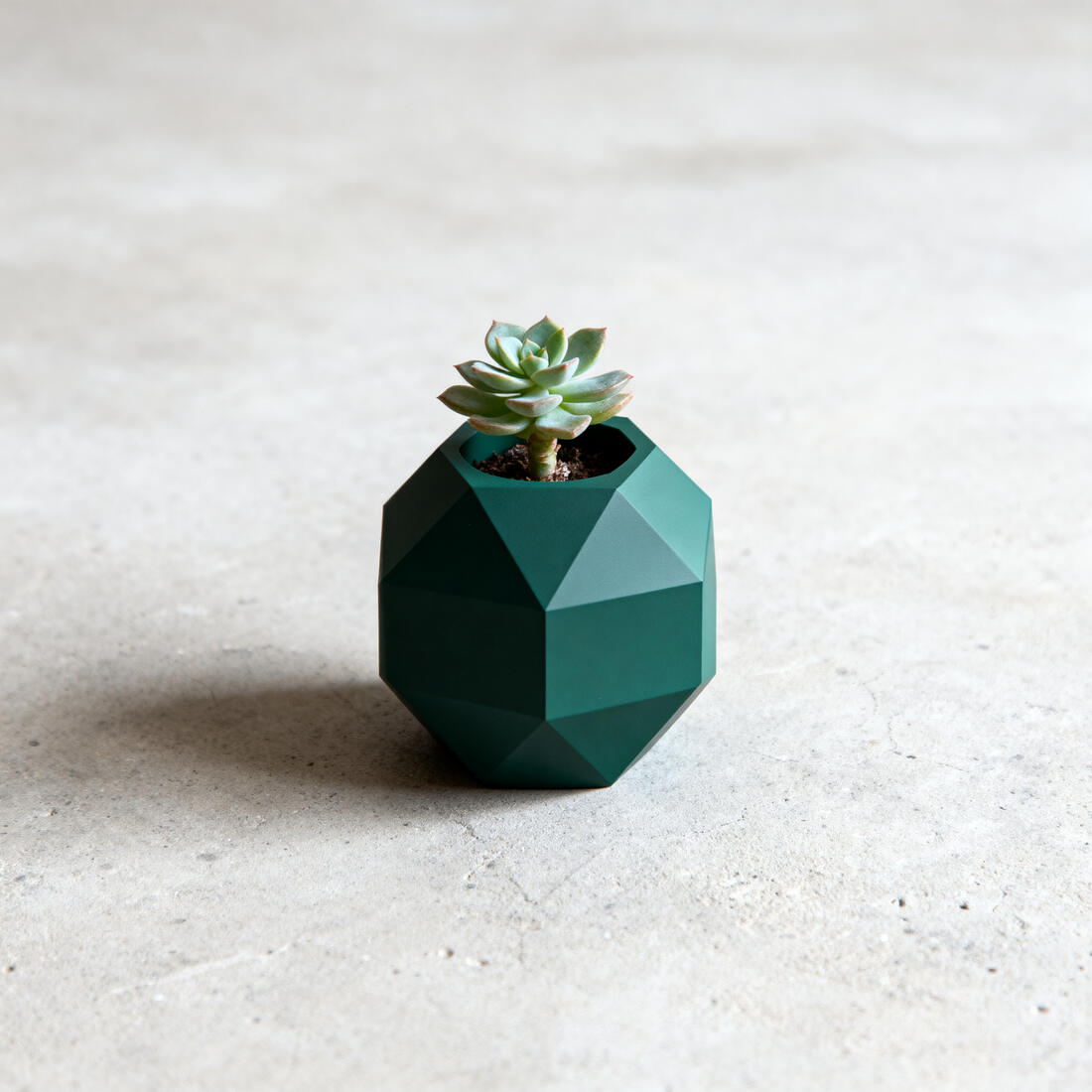 3D-gedruckter geometrischer Übertopf in Grün